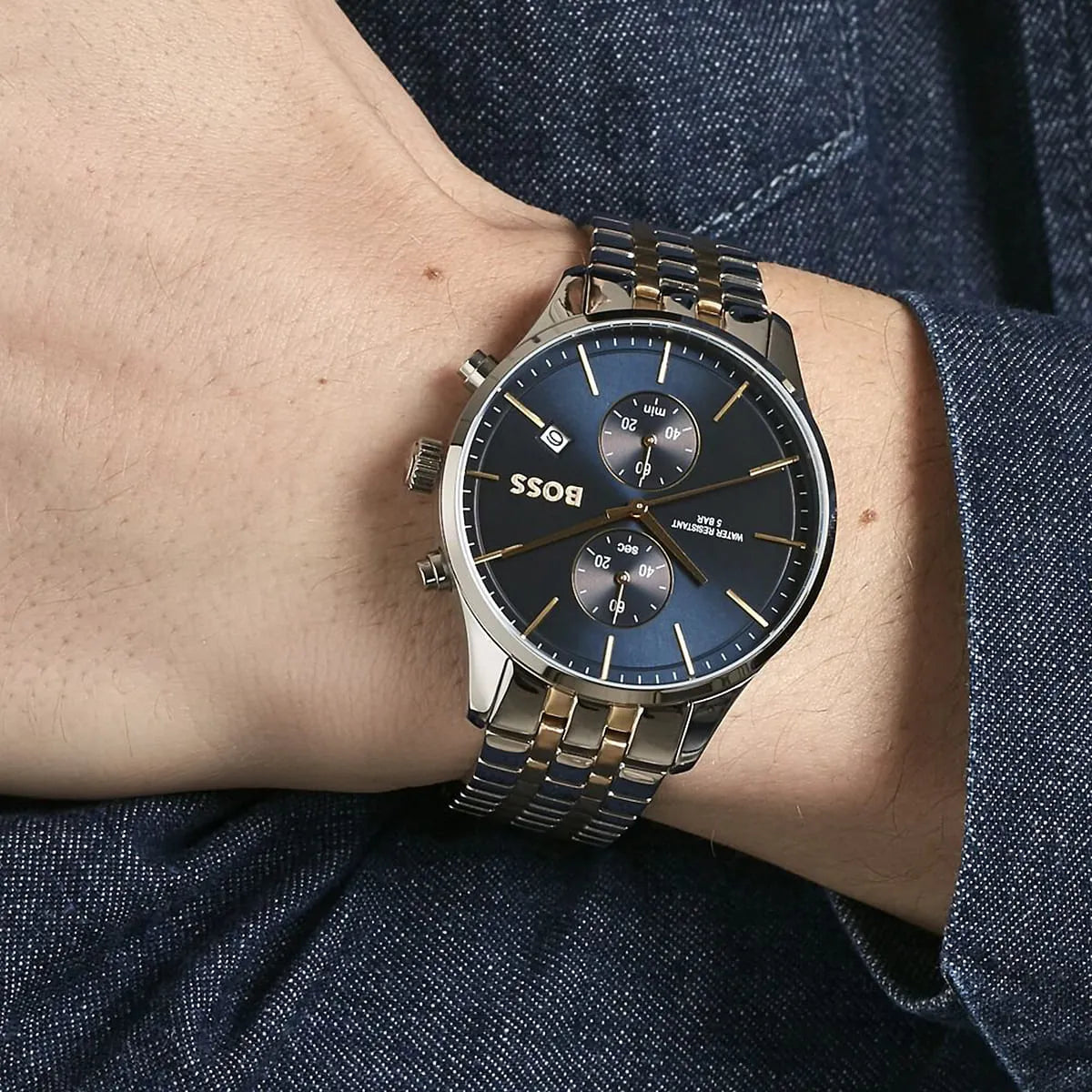 Hugo Boss Associate watch on wrist with blue dial and chronograph subdials visible
