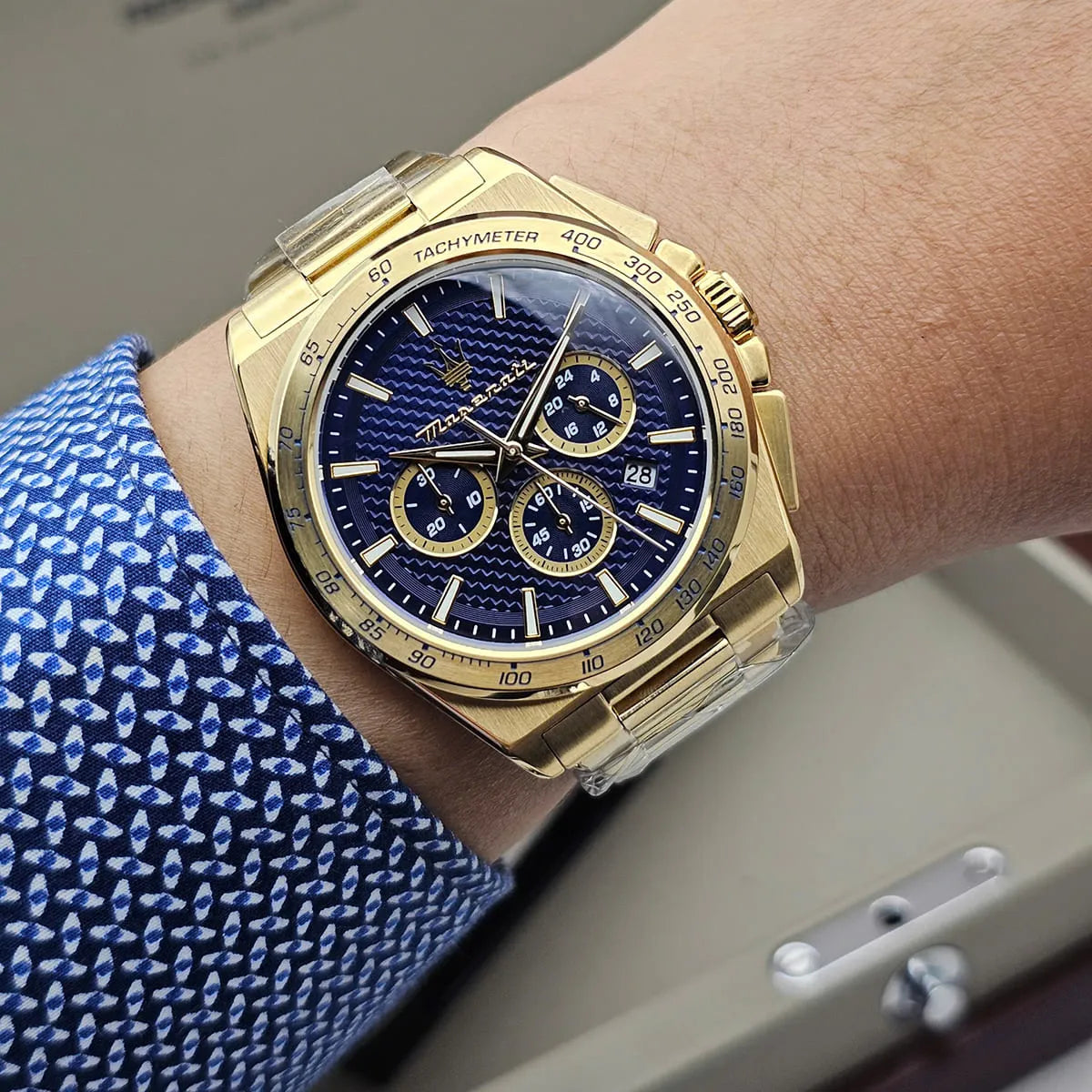 Maserati Velocità chronograph gold watch worn on wrist