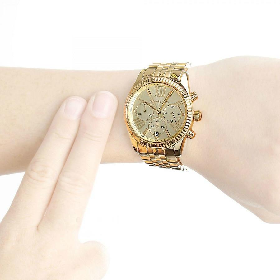 Michael Kors Lexington Chronograph Champagne Dial Ladies Watch MK5556 Water resistance: 100 meters / 330 feet Movement: Quartz