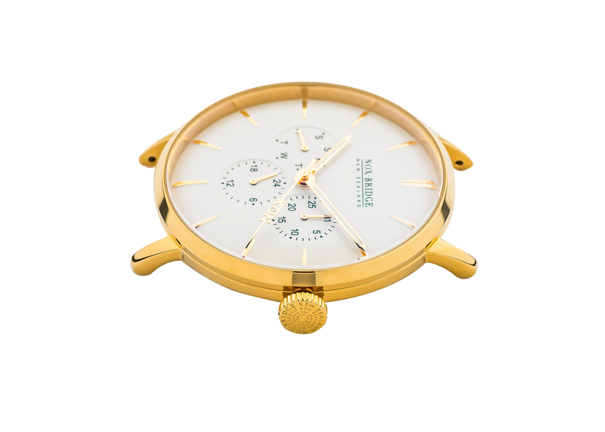 Angled view of Noxbridge Capella 36MM gold watch showing case and dial