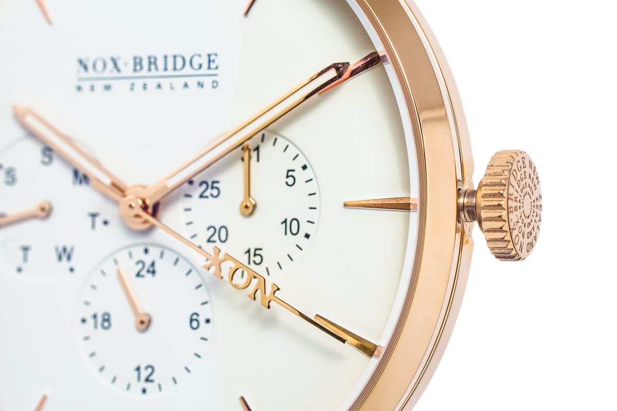 Close-up of Noxbridge Classic Izar dial showing chronograph subdials, rose gold case, and crown detail