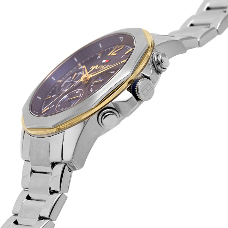 Side profile of Tommy Hilfiger chronograph showing case depth and metal link bracelet