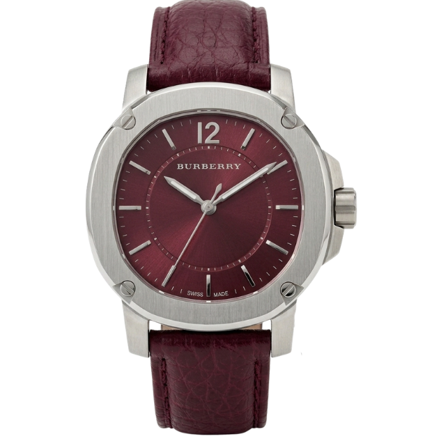 A Burberry men's watch featuring a round silver-tone stainless steel case, a deep burgundy dial with silver-tone hands and markers, and a matching burgundy leather strap with a textured grain pattern.